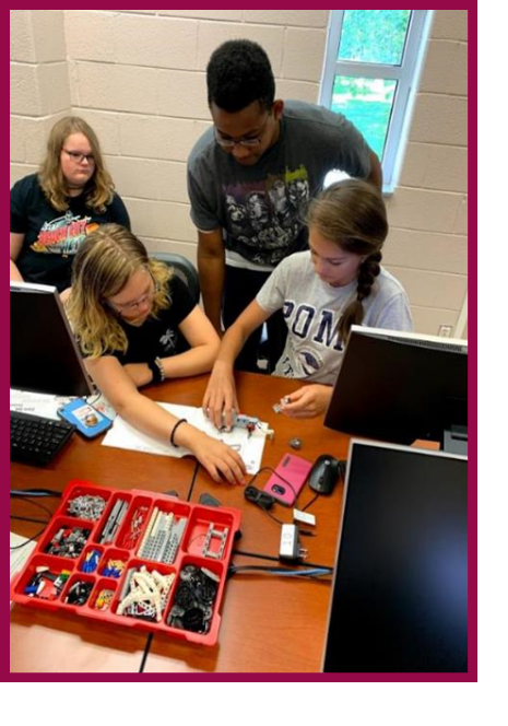 Upward Bound students building a computer